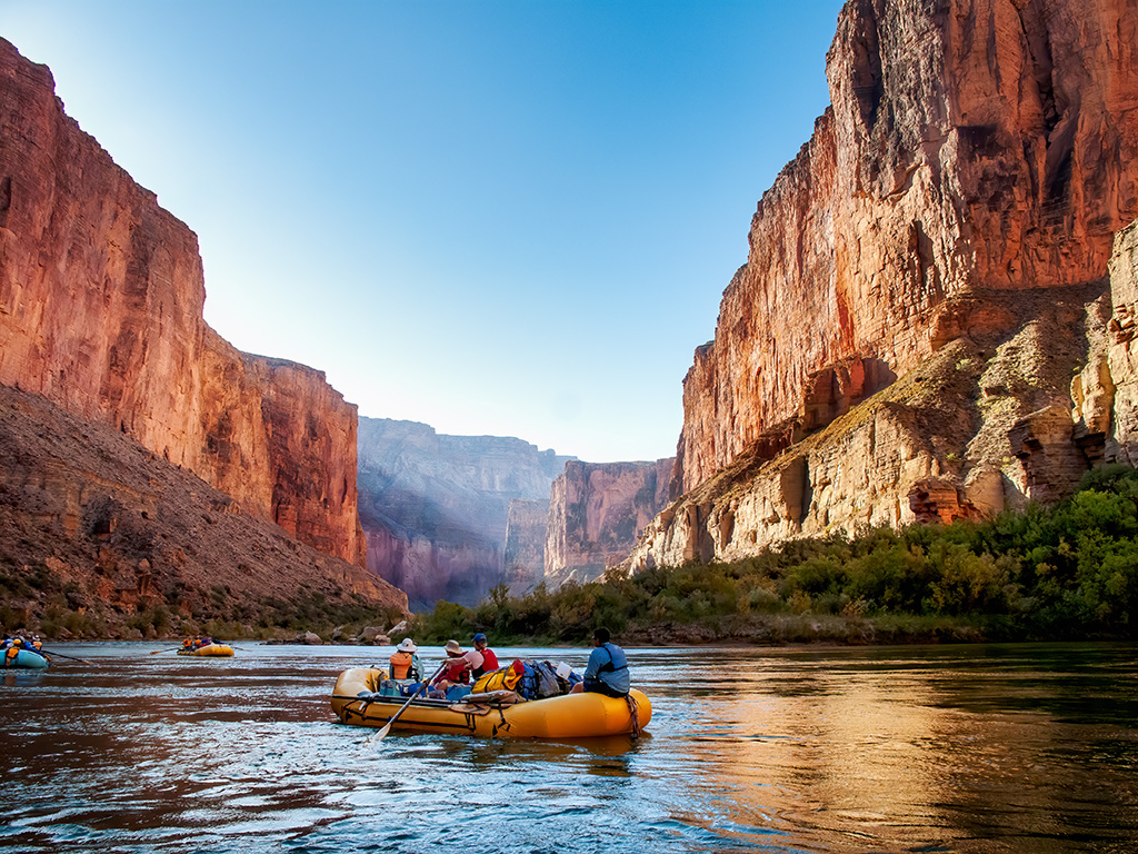 People enjoying WHITEWATER rafting